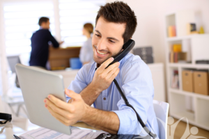 Man on phone in office